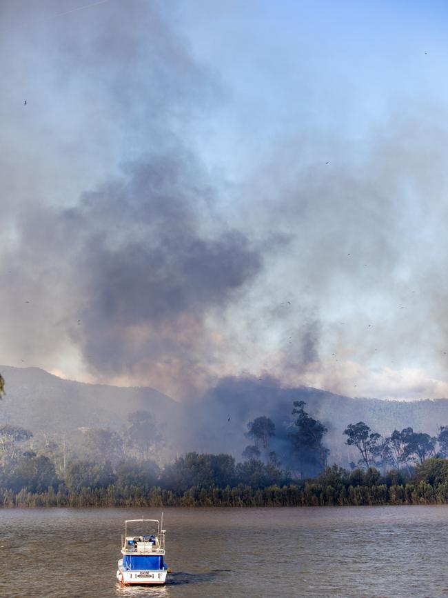 Firefighters are at the scene of a vegetation fire that is in inaccessible country at The Common along the Fitzroy River with the smoke blowing across the water into Depot Hill.