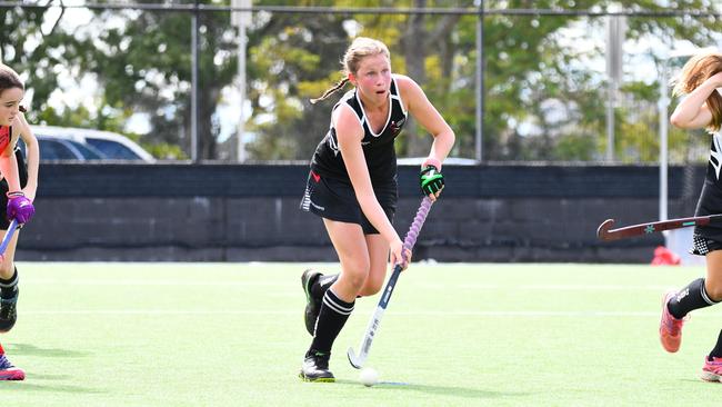 Skye Vaughan, 13, playing hockey for the Norths Hockey Club Mackay. Picture: Contributed