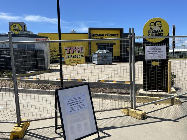 Guzman y Gomez’s Willows store was fenced off while repairs and upgrades were carried out. Picture: Leighton Smith.