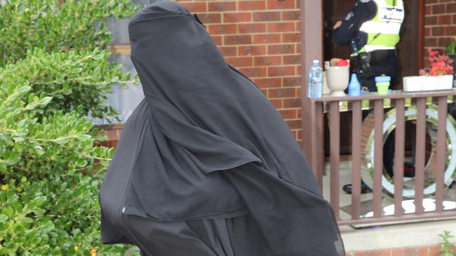 A woman arrives at the Dallas address. Picture: Alex Coppel.