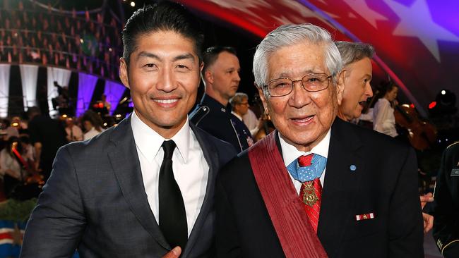 Actor Brian Tee and Hiroshi ‘Hershey’ Miyamura pose during the finale of the 2018 National Memorial Day Concert in Washington. Picture: Getty Images