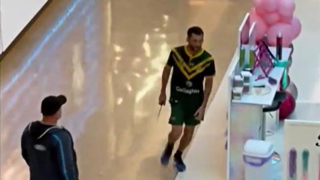 Video footage shows Joel Cauchi with knife in hand, running through Bondi Junction Westfield shopping centre as people try to disperse. Picture: 9News