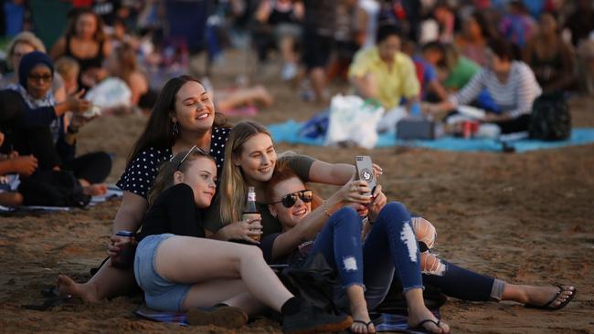 L to R, Zoe Kanke, Tegan Wattam , Kira Janke and Paris Wright at Mindil Beach to watch theTerritory Day fireworks. Picture: Glenn Campbell