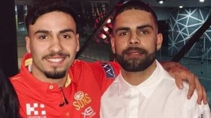 Kobe Rankine (right), the brother of Crows AFL footballer Izak Rankine (left), has been charged over the alleged assault of his pregnant partner. Pictures: Facebook