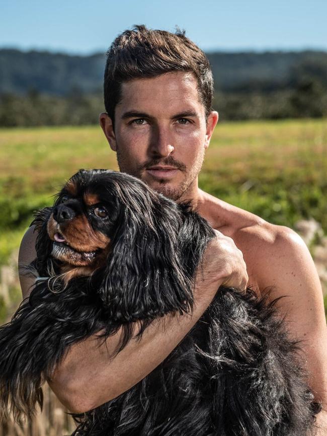 The annual hot guys and rescue dog calendar raises funds for no-kill shelters. Picture: Jason Lee