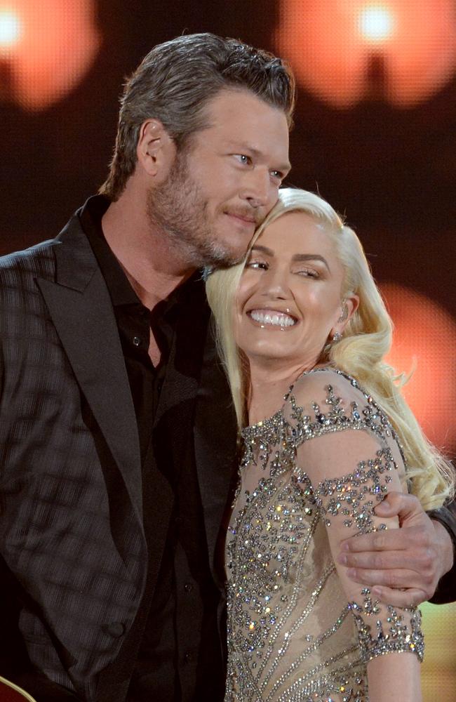 Stefani and Shelton embrace after their performance. Picture: Kevin Winter/Getty Images/AFP