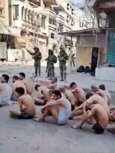 The men were stripped to their underwear and lined up on the street. Picture: Supplied