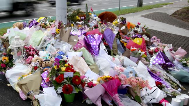 Flowers left at the site of the horrific Australia Day accident. Picture: Steve Pohlner