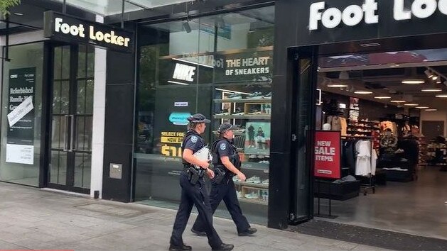 Police outside the Rundle Mall Foot Locker on Wednesday. Picture: Charlie Dadds