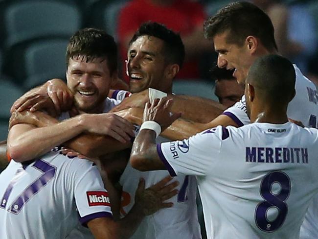 GOSFORD, AUSTRALIA - DECEMBER 31: Diego Castro of Perth Glory celebrates his goal with team mates during the round 12 A-League match between the Central Coast Mariners and the Perth Wildcats at Central Coast Stadium on December 31, 2019 in Gosford, Australia. (Photo by Ashley Feder/Getty Images)
