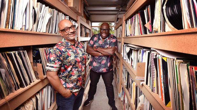 British DJs Carl Cox and Eric Powell surrounded by Cox’s extensive record collection. Picture: Nicki Connolly