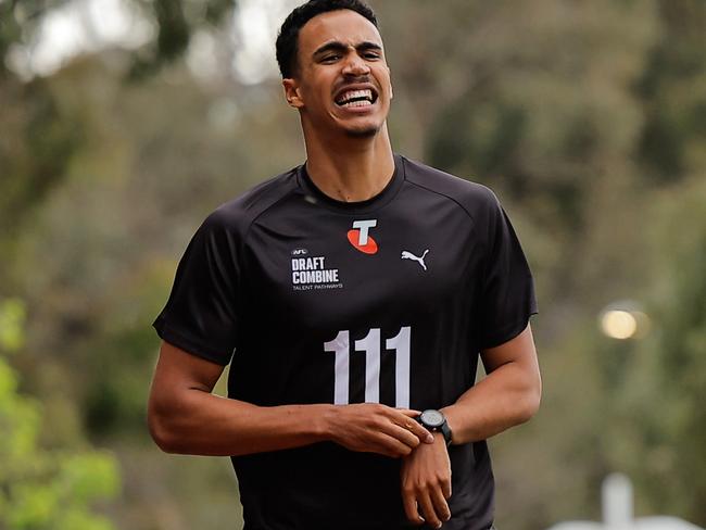 MELBOURNE, AUSTRALIA - OCTOBER 04: Adrian Cole (Victoria Metro - Sandringham Dragons) crosses the finish line during the 2km time trial during the Telstra AFL National Draft Combine Day 1 at the AIA Centre on October 04, 2024 in Melbourne, Australia. (Photo by Dylan Burns/AFL Photos via Getty Images)