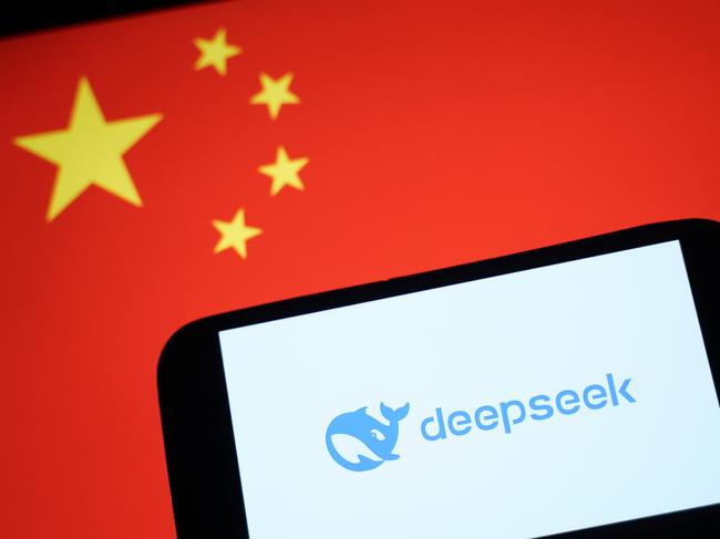 HONG KONG, CHINA - JANUARY 28: In this photo illustration, the DeepSeek logo is seen on a phone in front of a flag of China on January 28, 2025 in Hong Kong, China. Global tech stocks have plummeted following the emergence of DeepSeek, a Chinese AI startup that has developed a competitive AI model at a fraction of the cost of its US rivals, sparking concerns about the high valuations of tech giants like Nvidia. This development has led to significant declines in tech shares across Asia and Europe, with markets in both regions experiencing notable losses as investors reassess the AI landscape and its potential impact on the industry's future. (Photo illustration by Anthony Kwan/Getty Images)