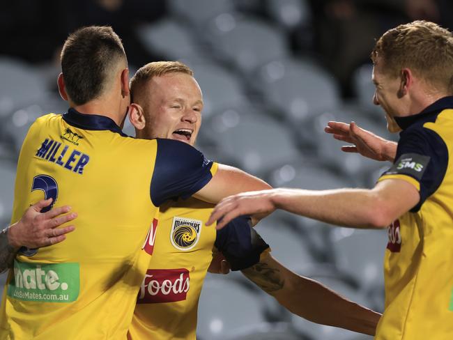 GOSFORD, AUSTRALIA - JUNE 05: Jack Clisby of the Mariners celebrates a goal with team matesduring the A-League match between Central Coast Mariners and Western United at Central Coast Stadium, on June 05, 2021, in Gosford, Australia. (Photo by Mark Evans/Getty Images)