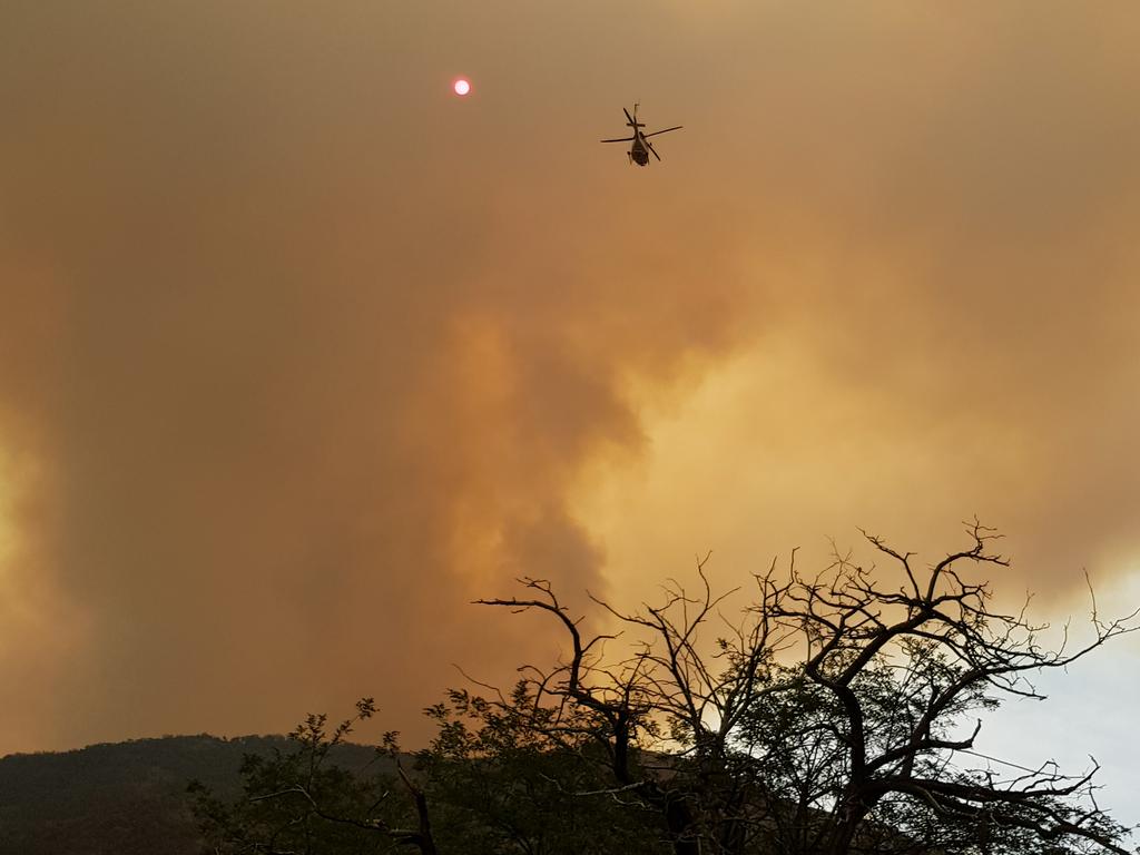 Residents of the small rural village of Tharwa have been told that it's too late to leave. Picture: Ralph Hurst-Meyers/AAP