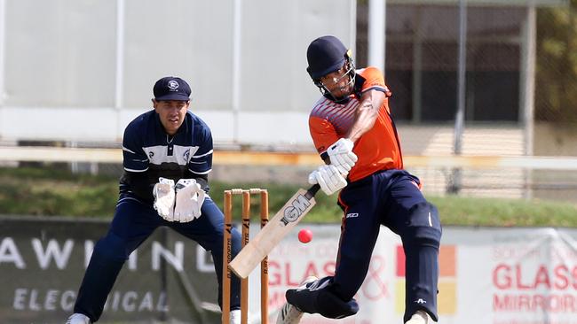 Action pictures of Taper Premier Cricket between Runaway Bay (orange) and Broadbeach at Broadbeach Robina Cricket Club. Nico Reifer. 12 November 2022 Mermaid Waters Picture by Richard Gosling