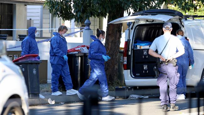 Police and forensics pictured outside the Campsie home where the stabbings allegedly occurred. Picture: NCA NewsWire / Damian Shaw