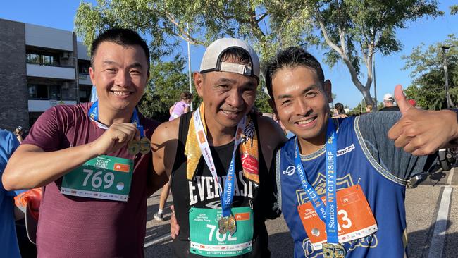 (L-R) Paul Liu, Roberto Lay and Maca Morooka all competed in the NT City2Surf on Sunday.