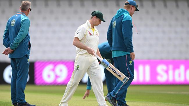 Steve Smith looks at the wicket with coach Andrew McDonald at Headingley