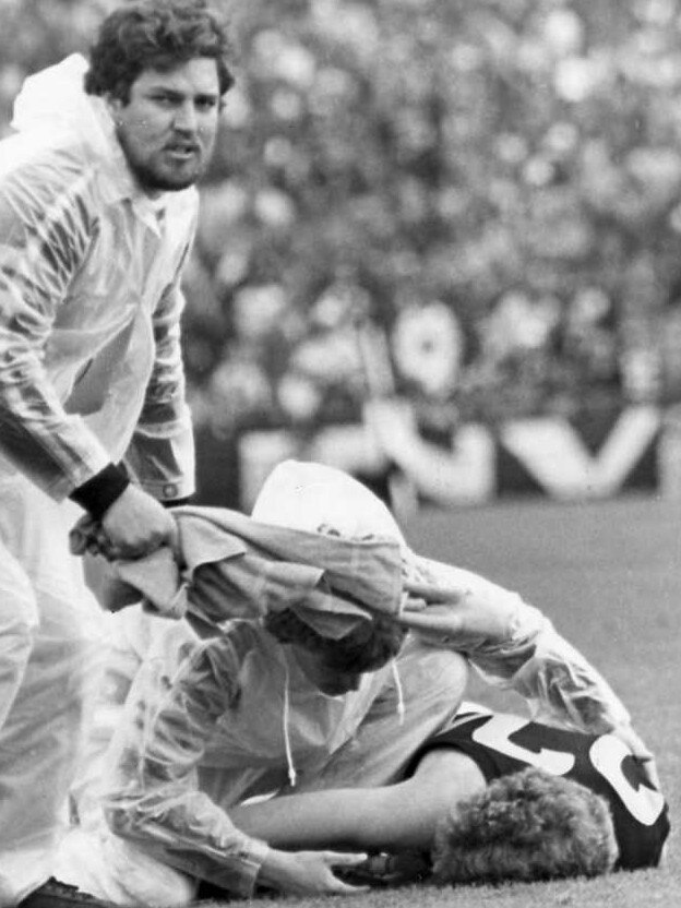 Glenelg’s Neville Caldwell after being knocked out by David Granger in the 1981 grand final.