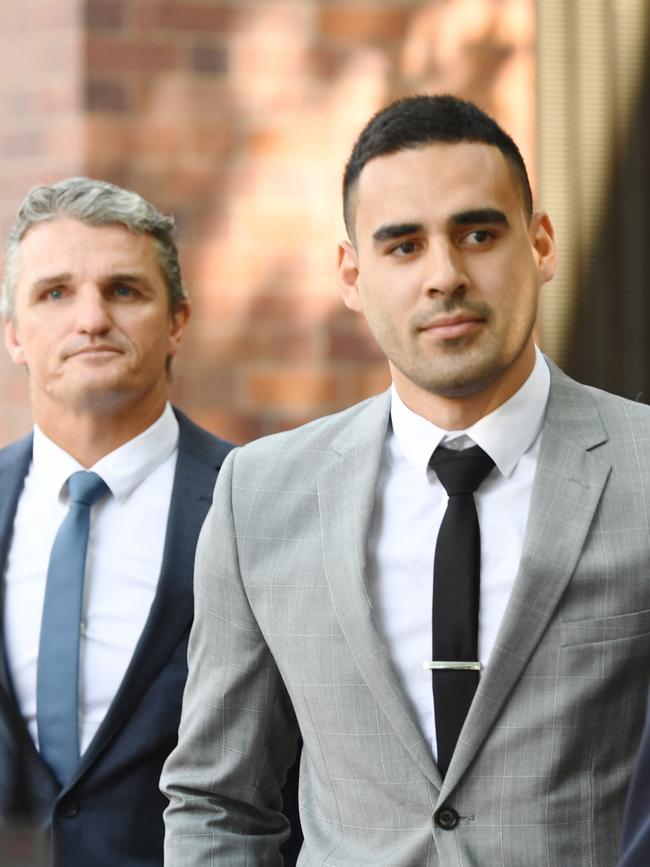 Ivan Cleary supports Tyrone May as he leaves Parramatta Local Court in Sydney, Friday, November 22, 2019. AAP Image/Dean Lewins