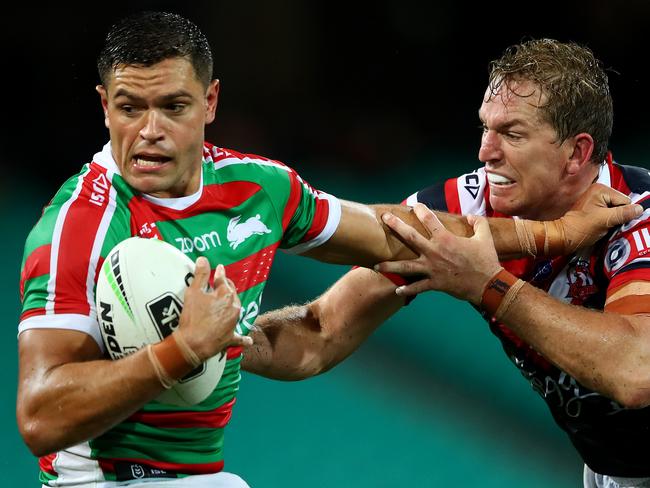 SYDNEY, AUSTRALIA - MARCH 15: Braidon Burns of the Rabbitohs is tackled by Mitch Aubusson of the Roosters during the round one NRL match between the Sydney Roosters and the South Sydney Rabbitohs at Sydney Cricket Ground on March 15, 2019 in Sydney, Australia. (Photo by Cameron Spencer/Getty Images)