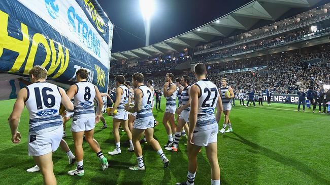 The Geelong Cats come out in front of the new Brownlow Stand at Simonds Stadium. (Photo by Quinn Rooney/Getty Images)