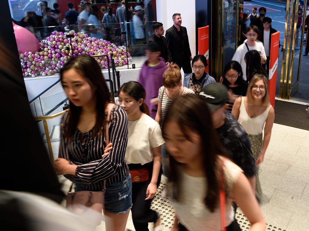 The first shoppers enter David Jones Elizabeth Street Flagship store at 6am for Boxing Day sales in Sydney, Thursday, December 26, 2019. (AAP Image/Bianca De Marchi)