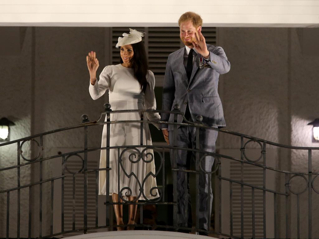 The Duke and Duchess of Sussex Prince Harry and Meghan on the balcony of the Grand Pacific Hotel in Suva on day one of their tour of Fiji. Picture: Nathan Edwards.