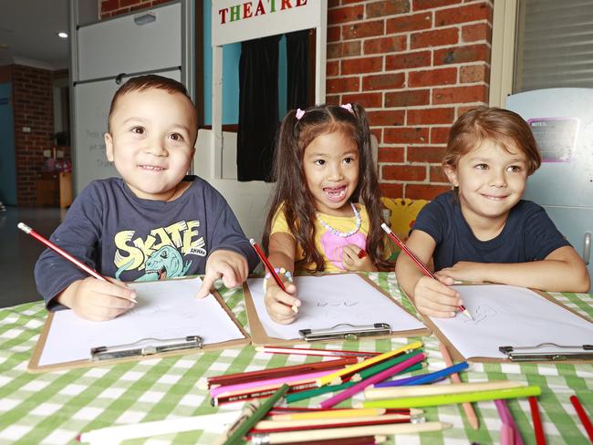 DAILY TELEGRAPH. FEBRUARY 14, 2023.Pictured at Connie's Child Care Centre in Mt Druitt today are kids Zane 4, Janea 4, and Aisha 4. Picture: Tim Hunter.