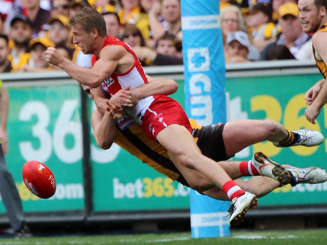 Brian Lake tackles Sydney’s Kieren Jack. Picture: Alex Coppel