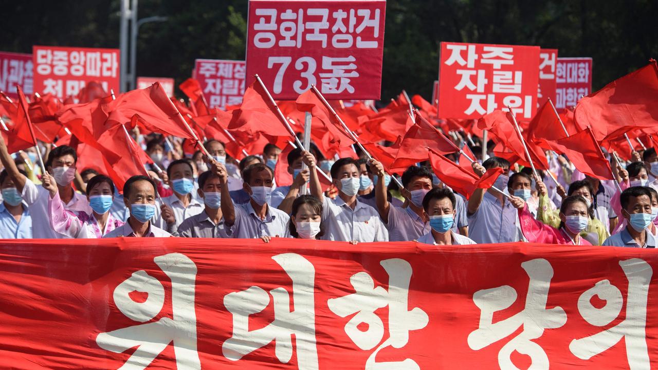 People take part in a mass demonstration in Pyongyang on September 9, 2021, to mark 73 years since the foundation of the Democratic People's Republic of Korea. Picture: Kim Won Jin/AFP