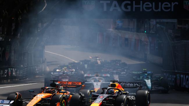 Oscar Piastri held off Max Verstappen at the start to retain third place