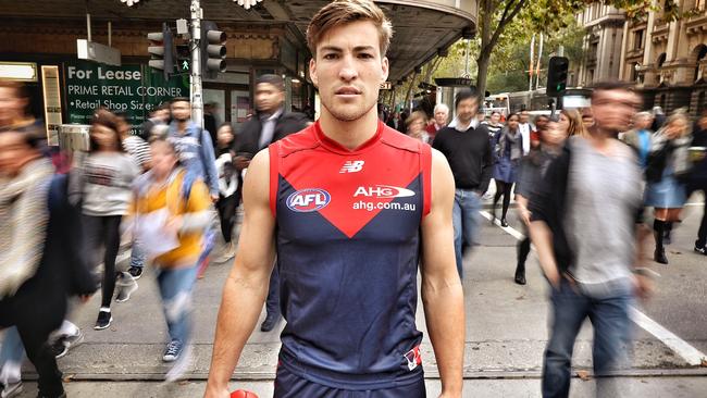 Melbourne midfielder Jack Viney on the corner of Collins St and Swanston St in Melbourne. Pic: Michael Klein