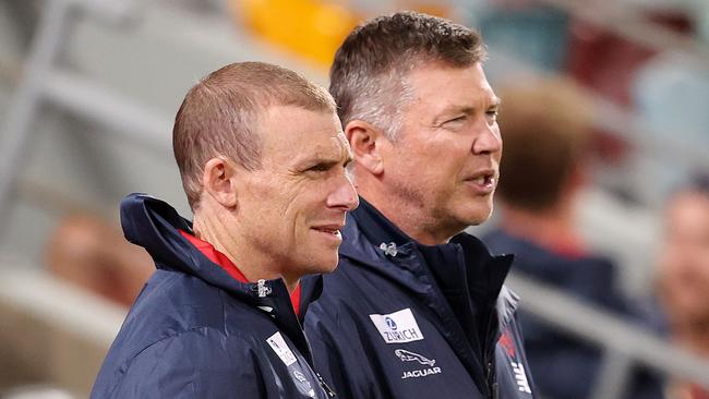 AFL Round 17. 12/09/2020. GWS Giants vs Melbourne at the Gabba, Brisbane..   Simon Goodwin, senior coach of the Demons and CEO Gary Pert     . Pic: Michael Klein