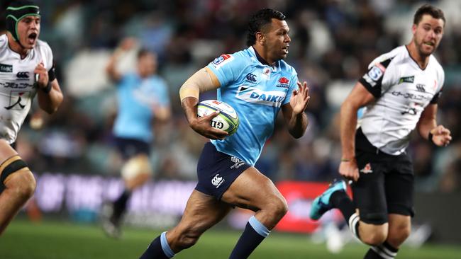 Waratahs star Kurtley Beale on his way to the tryline.