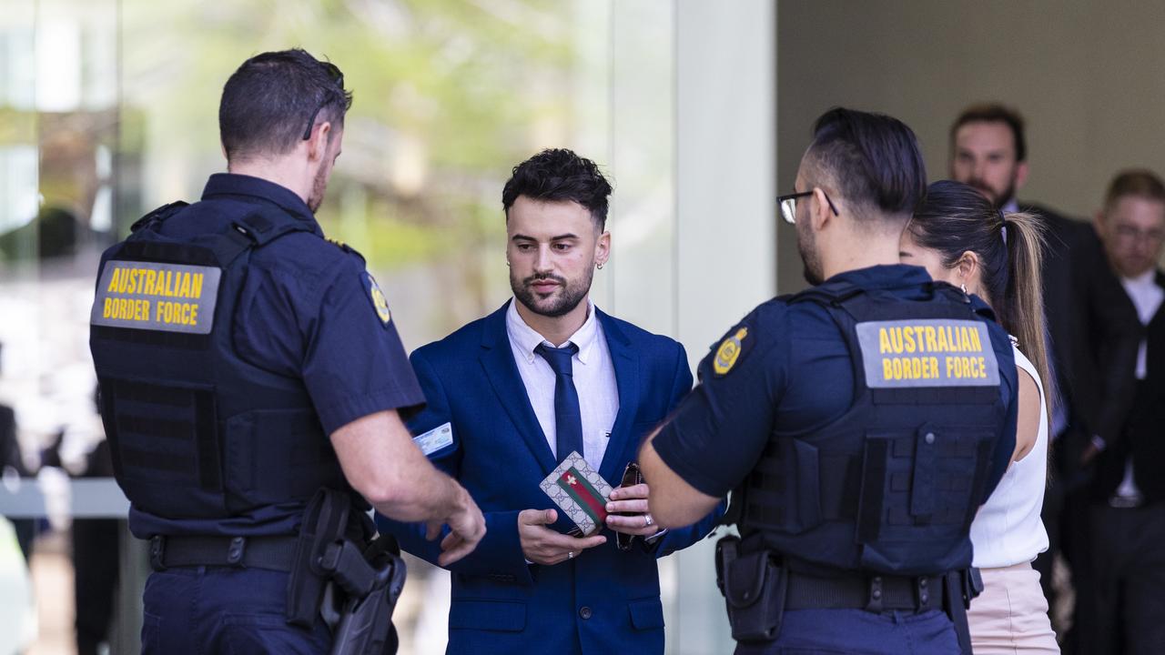 Giovanni Genuario leaves the Brisbane Supreme Court, only to be met by officers from the Australian Boarder Force.