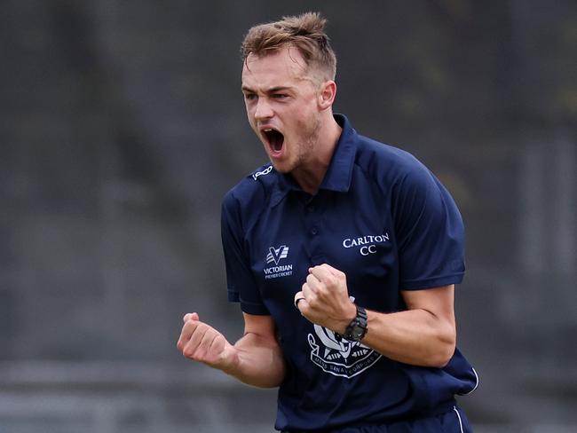 Premier Cricket GF: Casey South Melbourne v Carlton at the Albert Ground Melbourne. April 2nd 2022.  Xavier Crone of Carlton celebrates the wicket of Michael Wallace , caught by Mackenzie Harvey.Picture : George Sal