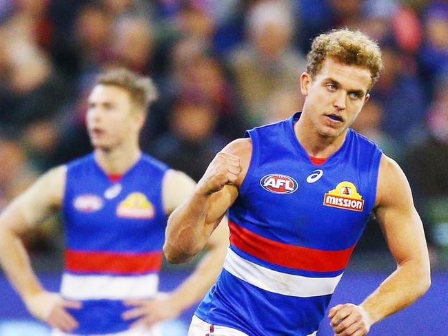 Mitch Wallis of the Bulldogs celebrates a goal during the round 17 AFL match between the Melbourne Demons and the Western Bulldogs at Melbourne Cricket Ground on July 14, 2018 in Melbourne, Australia. Picture: Michael Dodge, Getty Images.