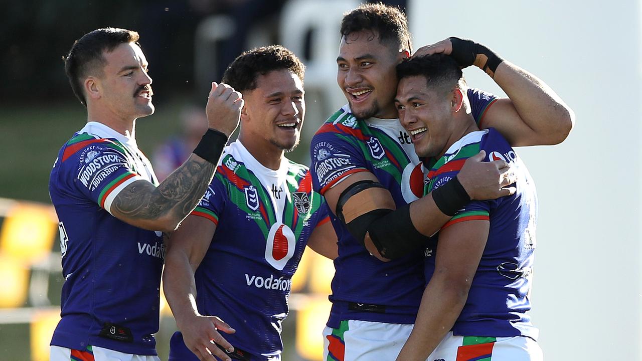 Roger Tuivasa-Sheck of the Warriors celebrates after scoring a try.
