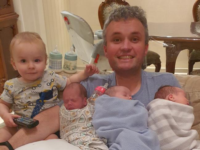 Russell Shields, 35, of WA, with Clayton, 1, Julian, Tristan and Georgia, born on February 27 in Georgia, Eastern Europe. They are stuck in Georgia because of coronavirus travel bans and can't get birth certificates for the kids. Picture: Supplied