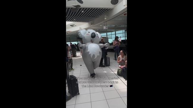 Sisters' very Aussie airport welcome