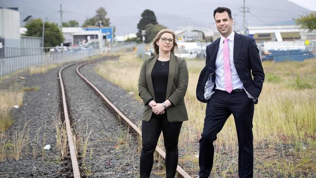 Shadow Education Minister Josh Willie and Indie School Campus Principal Lauren Watson on the proposed northern suburbs light rail line at Derwent Park. Picture Chris Kidd