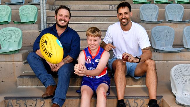 Member for Herbert Phillip Thompson with Thuringowa Bulldogs junior Alfie Kirchner and former Australian fast bowler Mitchell Johnson at Riverway Stadium. Picture: Evan Morgan