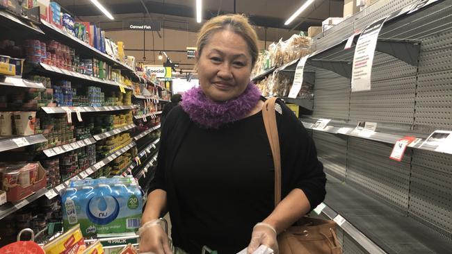 Shopper Ivona Latu stocks up at Pendle Hill Woolworths, but not on toilet paper.