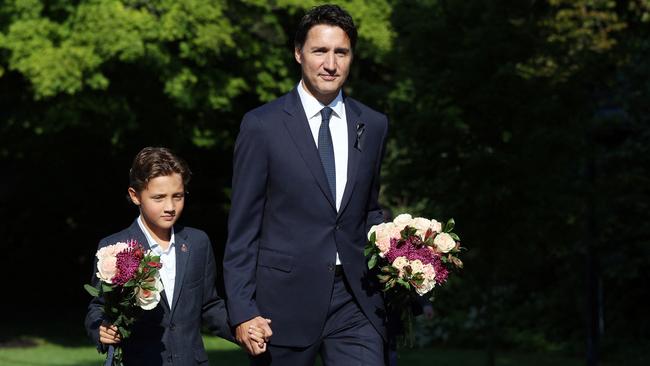 Canadian Prime Minister Justin Trudeau and his son Hadrien arrive for the reading of a proclamation on the accession of Britain's King Charles III during a ceremony at Rideau Hall in Ottawa over the weekend. Picture: AFP