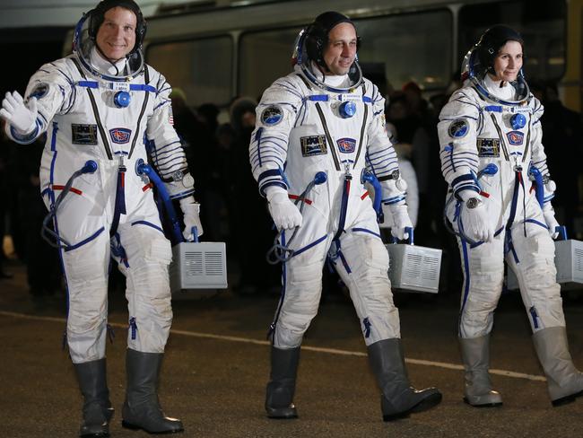 US astronaut Terry Virts (left) Russian cosmonaut Anton Shkaplerov (centre) and Italian astronaut Samantha Cristoforetti, are crew members of the mission to the International Space Station. Picture: AP Photo/Dmitry Lovetsky