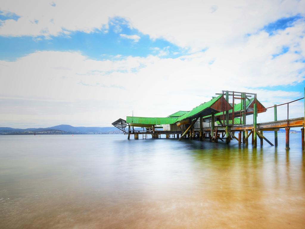 Your Focus on Tasmania. Sandy Bay boat sheds, Lord Beach. Picture: Kelvin Ball ***ONE TIME USE ONLY***