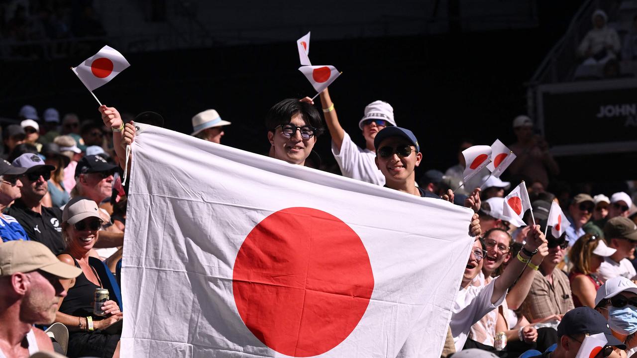 Japanese spectators supporting Osaka in her clash with Bencic. (Photo by WILLIAM WEST / AFP)