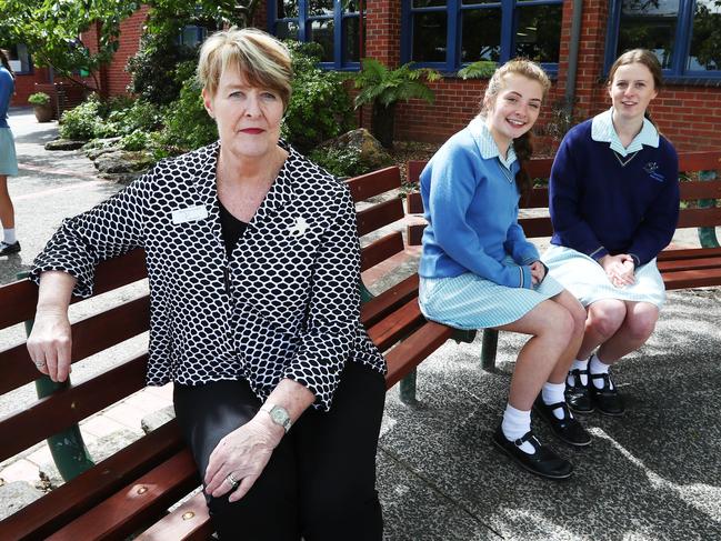 3/11/17 Mater Christi College principal Mary Fitz-Gerald with students (Rear L-R) Lauren Baker and Sophie Clarke at their school in Belgrave in Melbourne's eastern suburbs. Aaron Francis/The Australian